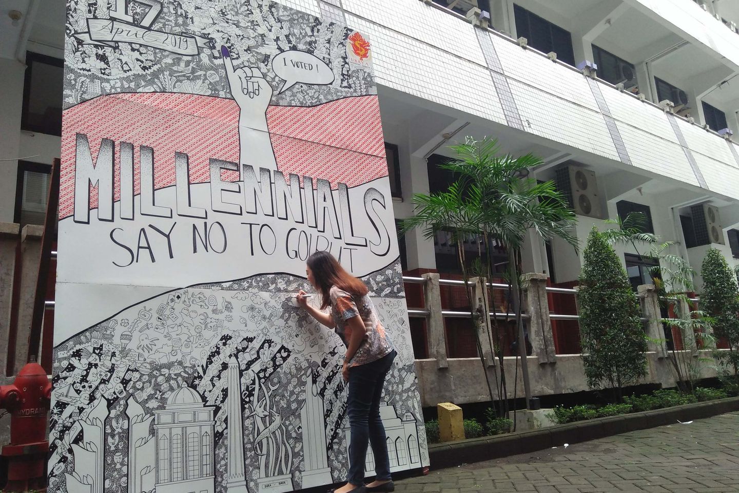 Mahasiswa Ubaya Ajak Milenial Tidak Golput dengan <em>Doodle Art</em>