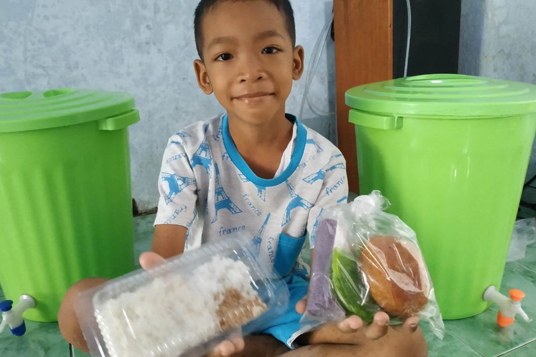 Usir <em>Pagebluk</em> Corona, Warga Mojokerto Selamatan Jajanan Pasar
