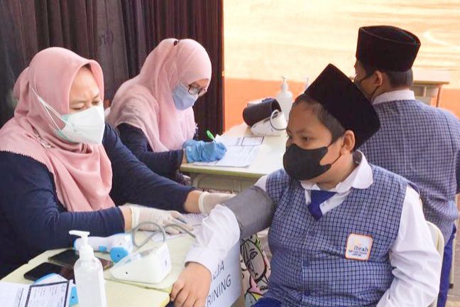Sebelum Divaksin, Pelajar di Gresik Baca dan Hafalkan Ayat Quran