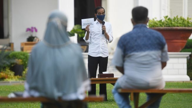 Soal Penanganan Covid-19 Jokowi Minta Menterinya Berhati-hati, Ini Pesannya