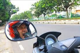 Ngantuk Saat Mengendarai Motor, Ini Tips Mengatasinya