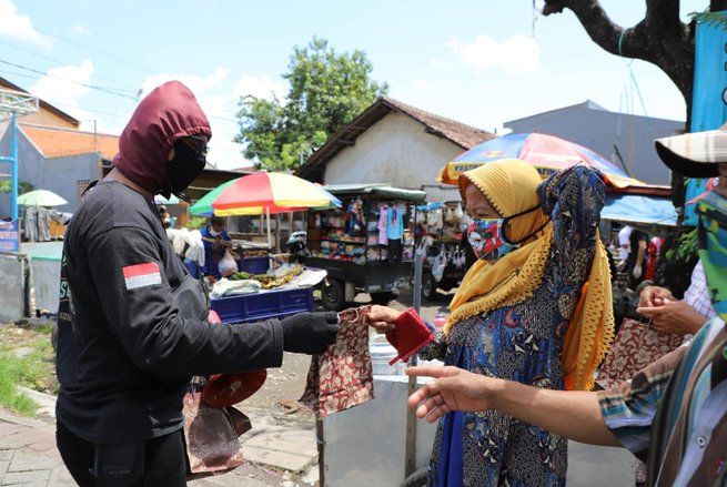 Ribuan Masker Disebar ke Pasar, Rentan Jadi Cluster Penyebaran Covid-19