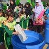 Hari Anak Nasional, Ribuan Anak dan Guru PAUD Gresik Bersedekah Sampah