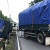 Hindari Pemotor, Truk Gandeng Terguling di Jalan Raya Bangsal Mojokerto 