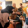 Ratusan Anak Yatim Piatu di Probolinggo Terima Bantuan Sepatu Olahraga