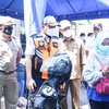 Gresik Terapkan Parkir Nontunai, Jukir Terima Uang akan Disanksi