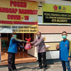 Dinas Sosial Bagikan Nasi Bungkus Kepada Petugas dan Relawan Posko Covid-19