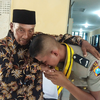 Anak Kuli Bangunan Jadi Lulusan Polisi Terbaik