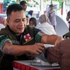 Bulan Bakti, TNI-Polri Gelar Pengobatan Gratis dan Bagikan Sembako di Lamongan