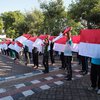 Pemkot Probolinggo Bagikan Ribuan Bendera Merah Putih Gratis di Bulan Kemerdekaan RI