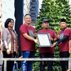 Komunitas Wartawan Grissee Catatkan Rekor MURI Gunungan Dari Rangkaian Sego Krawu Terbanyak